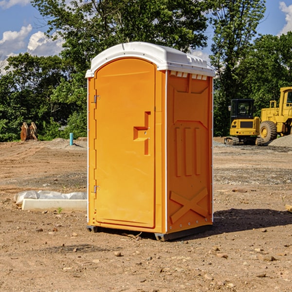 how often are the portable restrooms cleaned and serviced during a rental period in Grand Rivers